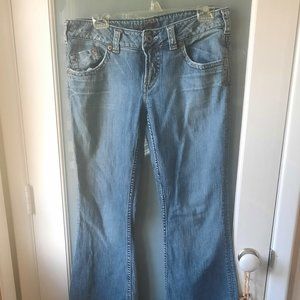 Silver low rise boot cut size 32